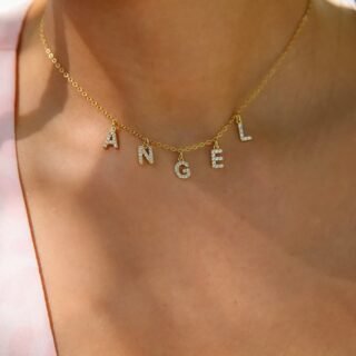 Woman’s personalized necklace with crystal letters